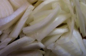 Onions are consumed in a huge quantity. They appear as a base flavor in foods around the world. They are one of the largest domesticated crops in the world. Eat an onion today.